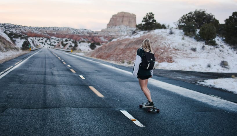 woman on a longboard